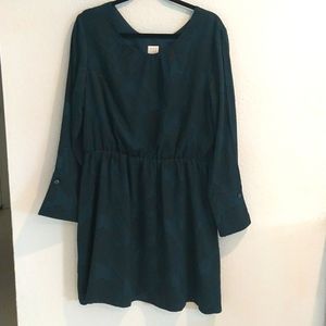 Beautiful black and blue long sleeve dress with open slit arms and flared cuff